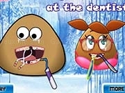 Play Pou girl at the dentist