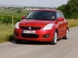 Play Puzzles red suzuki swift