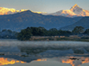 Spielen City by sea near the mountains jigsaw puzzle